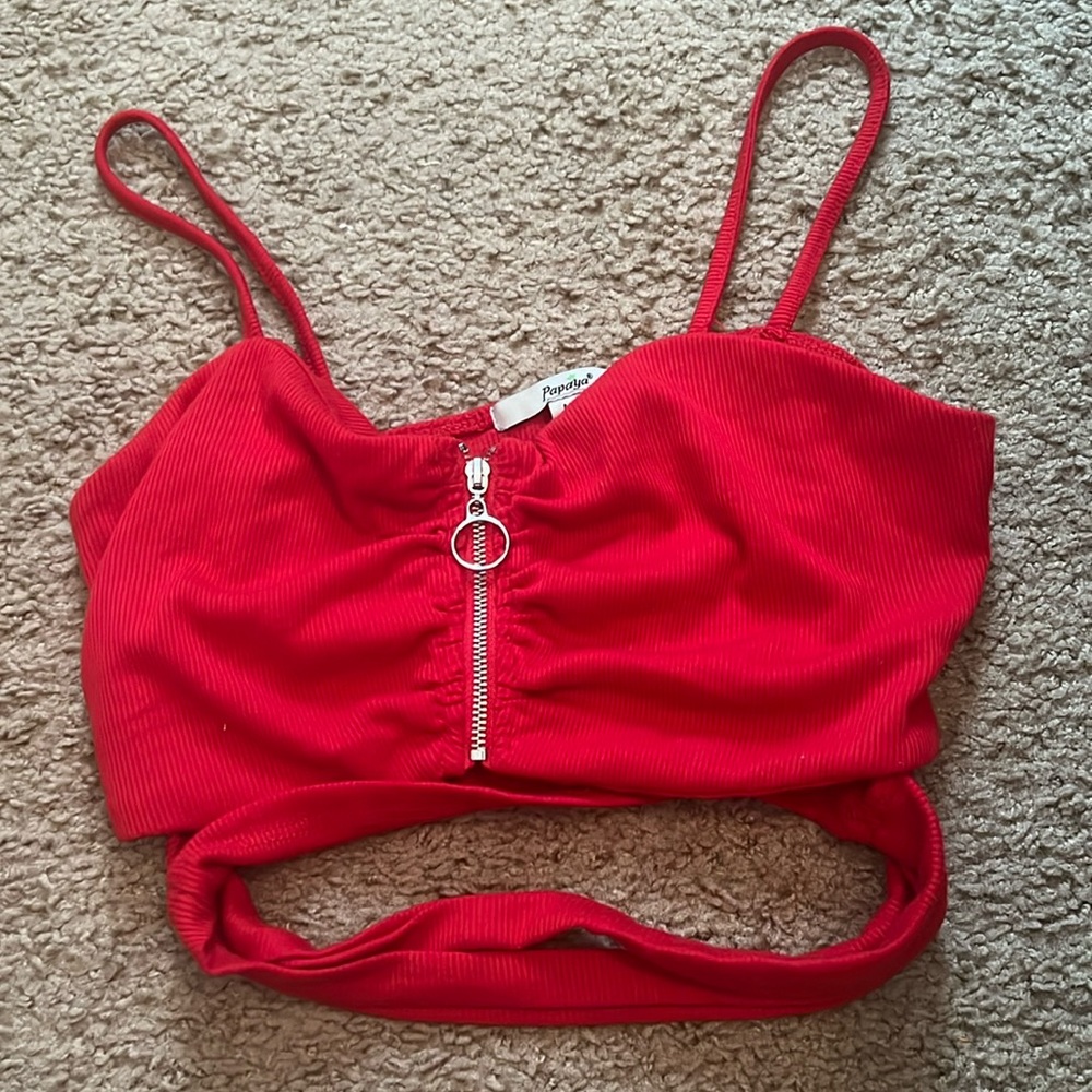 Super cute cropped, bright red top with stomach straps!